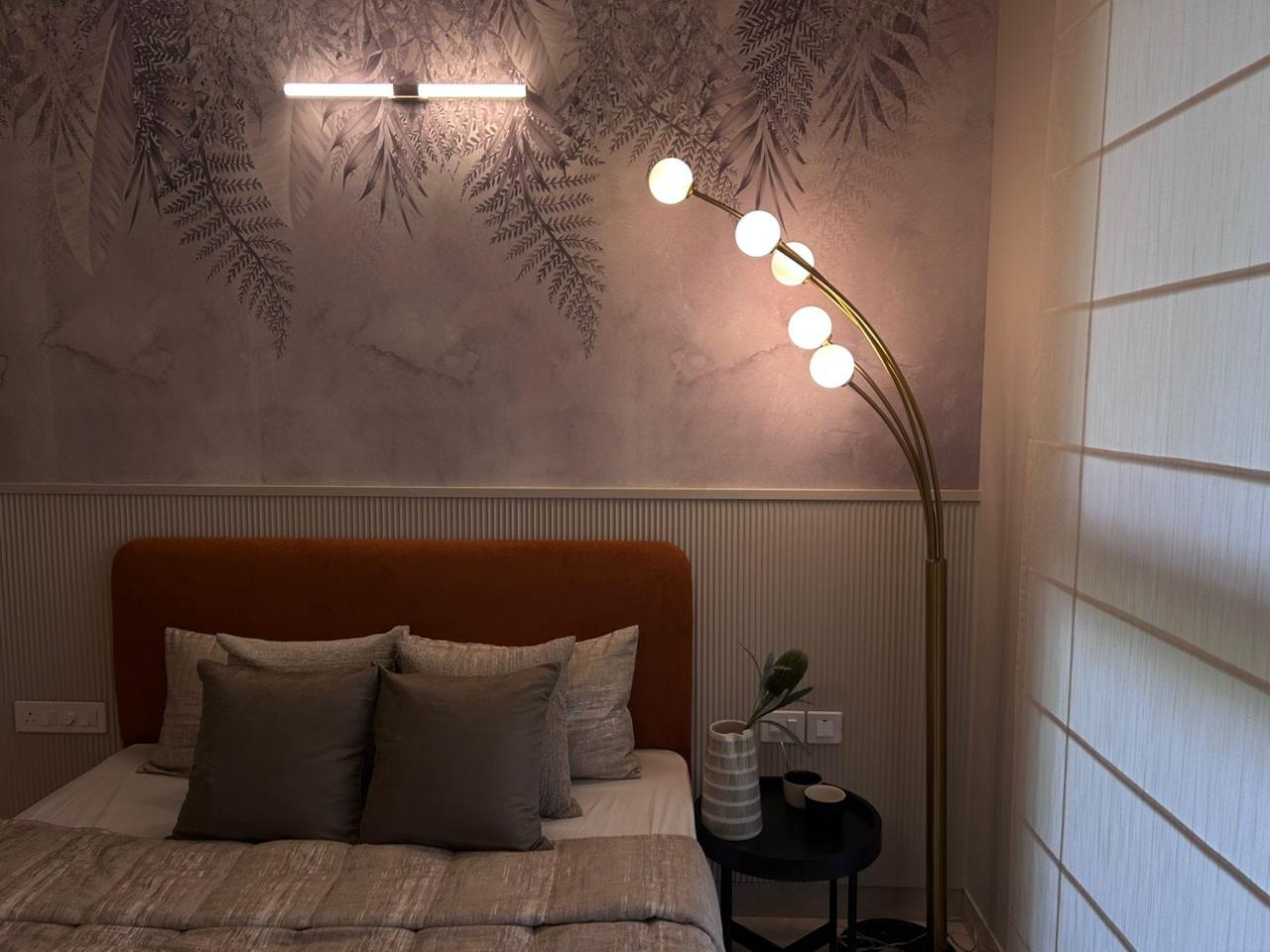 Elegant chandelier in living room residential project Bangalore